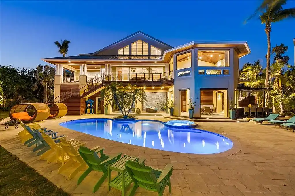 Luxury Gulf-front estate with private beach access and panoramic ocean views at 26 Sandy Hook Rd S, a high-end Sarasota home for sale.