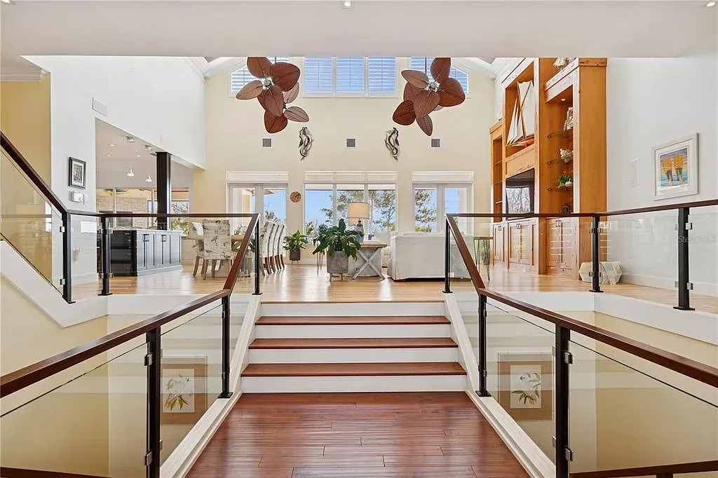 Luxury Gulf-front estate with private beach access and panoramic ocean views at 26 Sandy Hook Rd S, a high-end Sarasota home for sale.