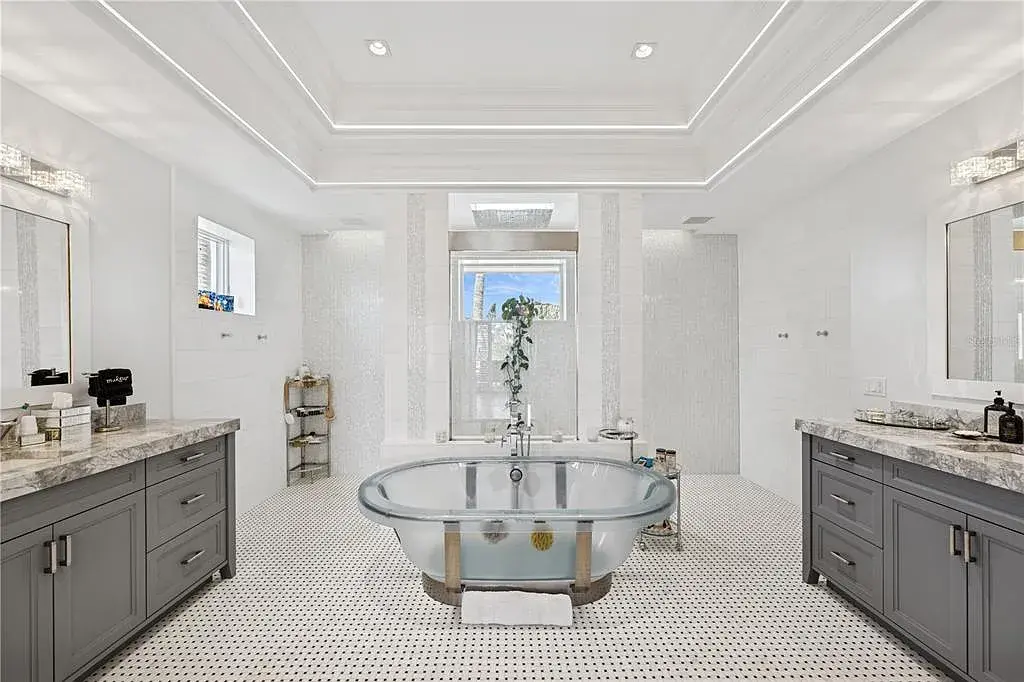 Luxury Gulf-front estate with private beach access and panoramic ocean views at 26 Sandy Hook Rd S, a high-end Sarasota home for sale.