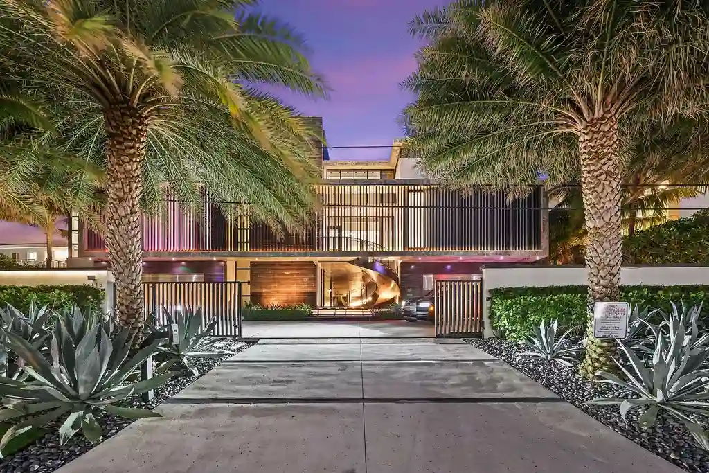 Oceanfront luxury estate at 3715 S Ocean Boulevard in Highland Beach featuring 11,000 sqft, infinity-edge pool, sky deck, and panoramic Atlantic views.