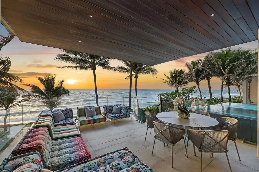 Oceanfront luxury estate at 3715 S Ocean Boulevard in Highland Beach featuring 11,000 sqft, infinity-edge pool, sky deck, and panoramic Atlantic views.