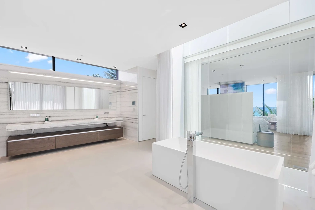 Oceanfront luxury estate at 3715 S Ocean Boulevard in Highland Beach featuring 11,000 sqft, infinity-edge pool, sky deck, and panoramic Atlantic views.