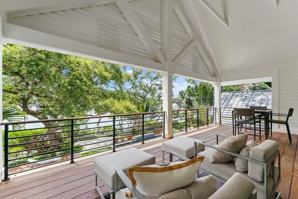 Waterfront estate at 5488 Pennock Point Road, Jupiter, Florida – featuring private dock, pool, and lush landscaping