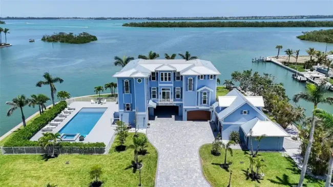 Waterfront Grandeur in Longboat Key: A $14.8 Million Bayfront Masterpiece with 880 Feet of Private Shoreline