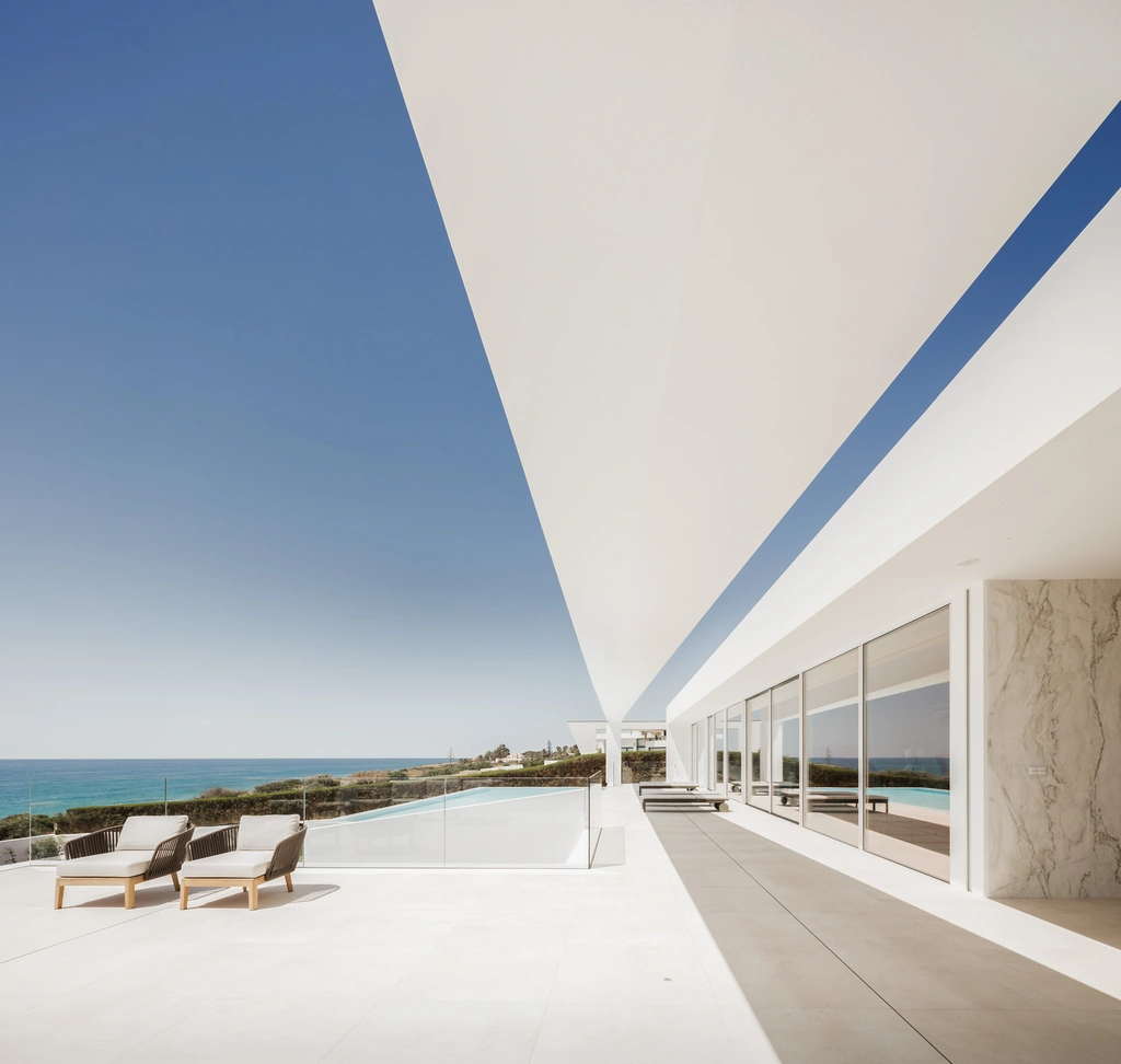 Carrara House in Algarve, Portugal by Mário Martins Atelier, A Monolithic Ode to Light and Landscape
