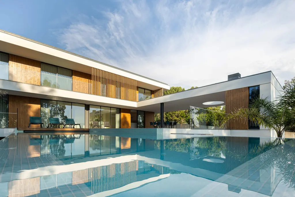 Casa J.M.C. by Atelier d’Arquitectura Lopes da Costa, A Harmonious Integration with the Landscape