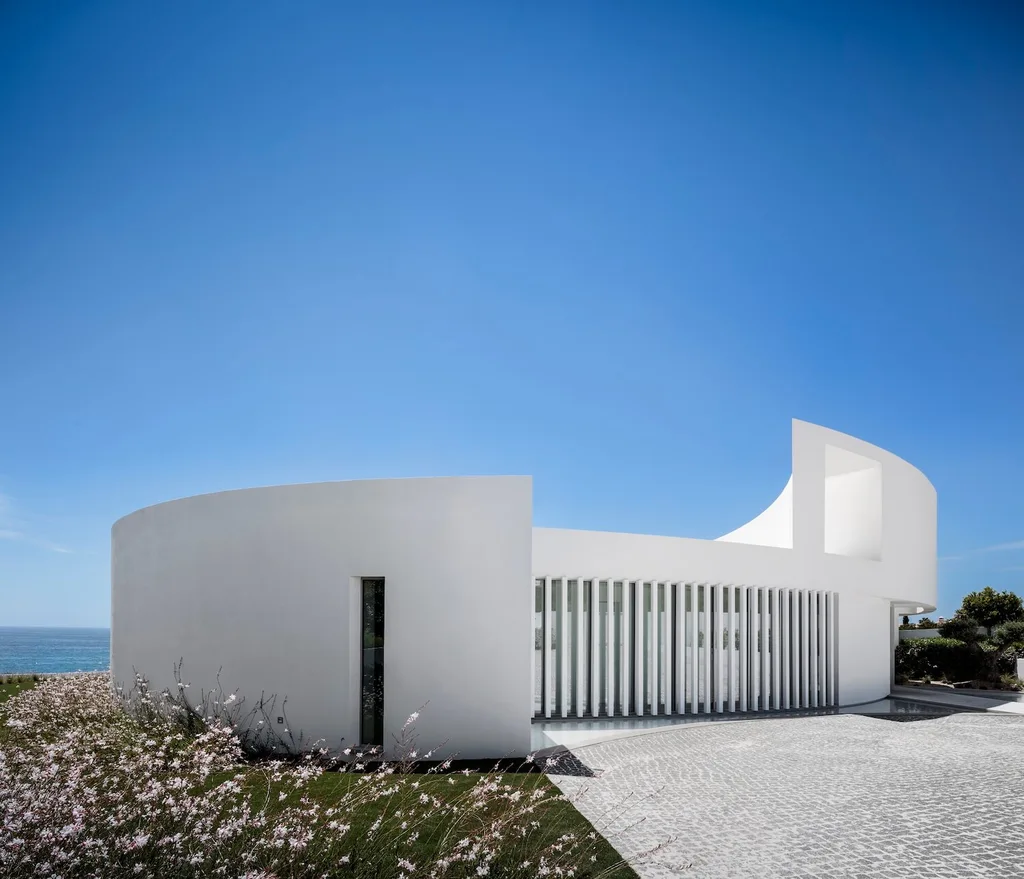 Elliptical House in Lagos Portugal by Mario Martins Atelier Merges Sculptural Form with Landscape Harmony 3