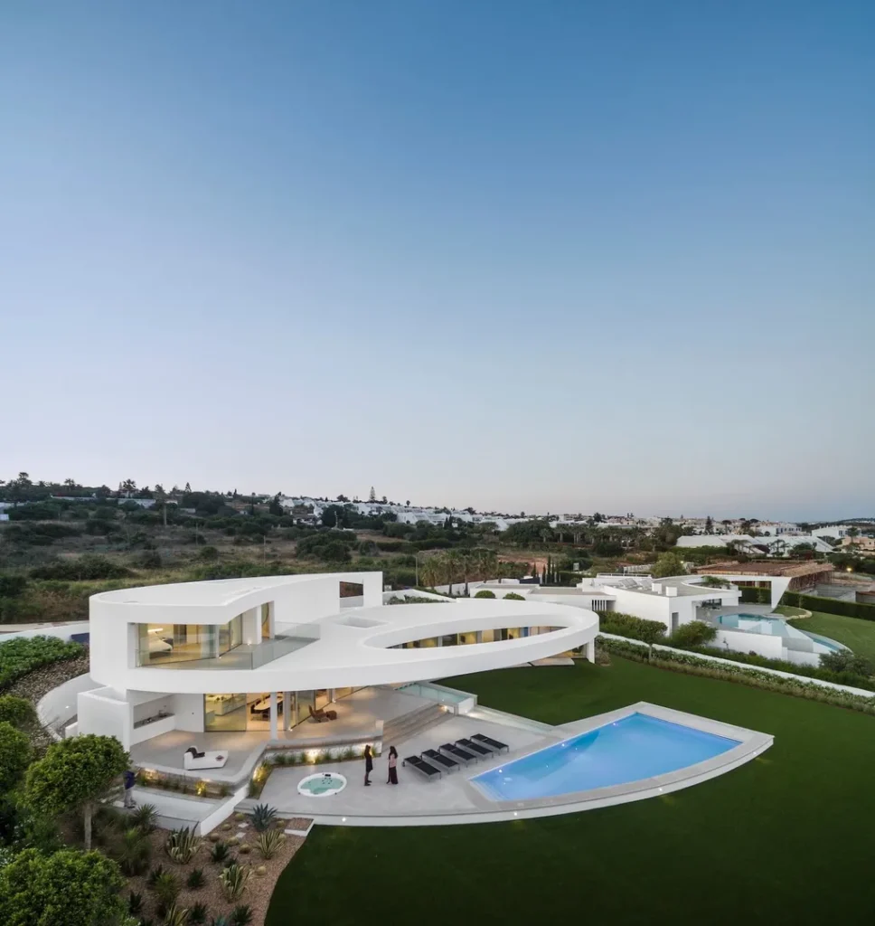 Elliptical House in Lagos, Portugal by Mário Martins Atelier Merges Sculptural Form with Landscape Harmony