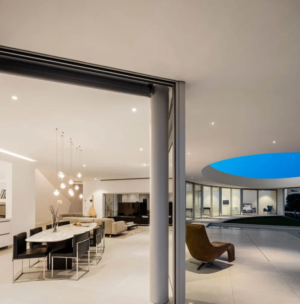 Elliptical House in Lagos Portugal by Mario Martins Atelier Merges Sculptural Form with Landscape Harmony 7