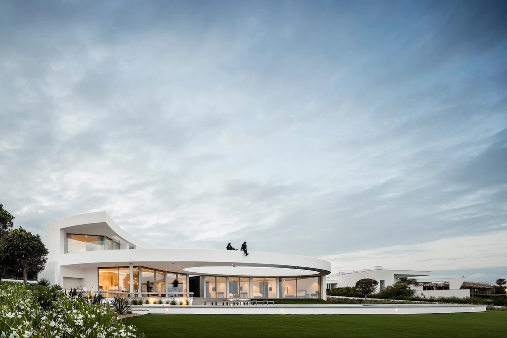 Elliptical House in Lagos, Portugal by Mário Martins Atelier Merges Sculptural Form with Landscape Harmony