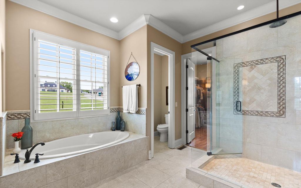Spectacular Custom Lakefront Estate at 316 Spoondrift Ct in Prestigious Lowes Ferry Community Listed for 2 11