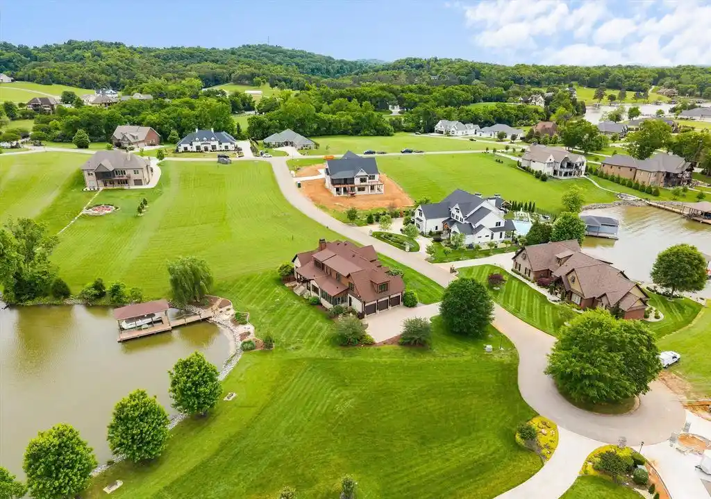 Spectacular Custom Lakefront Estate at 316 Spoondrift Ct in Prestigious Lowes Ferry Community Listed for 2 12