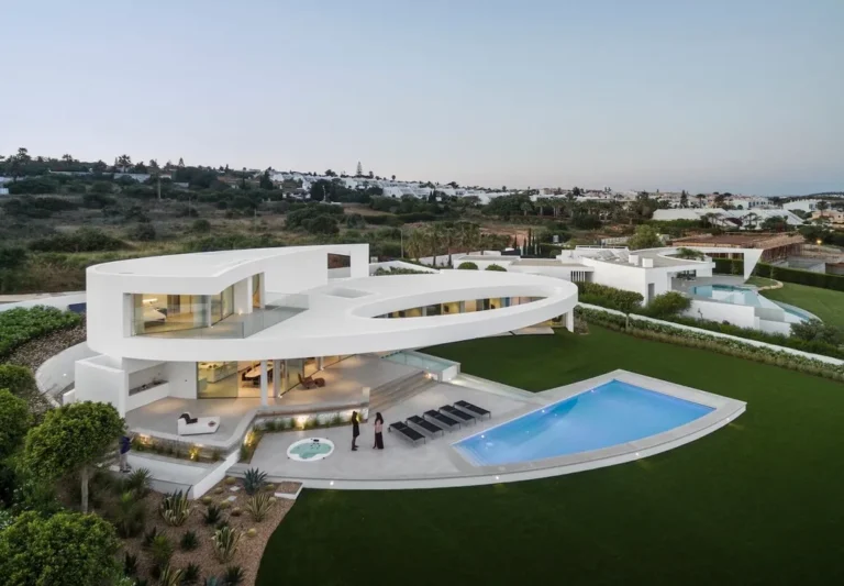Elliptical House in Lagos, Portugal by Mário Martins Atelier Merges Sculptural Form with Landscape Harmony