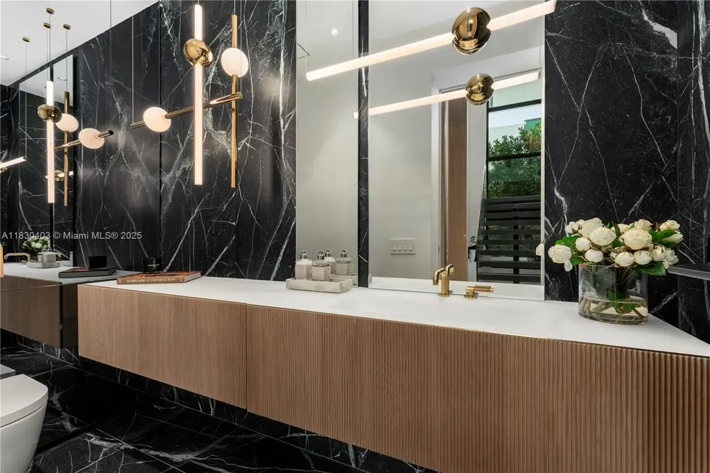 Custom Italian kitchen with Wolf appliances in Miami Beach home for sale