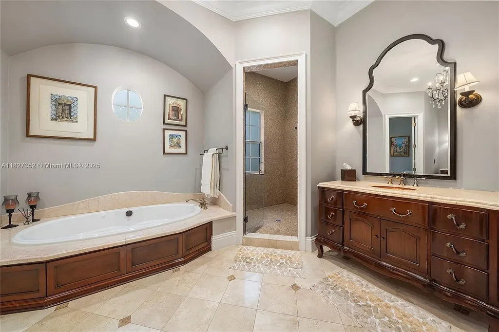 Front exterior view of 1171 Tiara Ct Coral Gables – a $5.1M luxury home with black-bottom pool, golf course views, and elegant Mediterranean-inspired architecture.