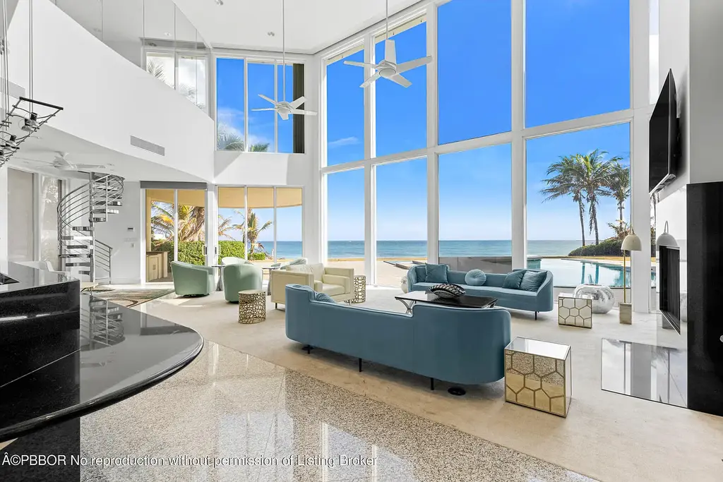 Aerial view of 1200 S Ocean Blvd Manalapan showcasing ocean-to-lake frontage, luxury estate with private pool, tennis court, and direct beach access