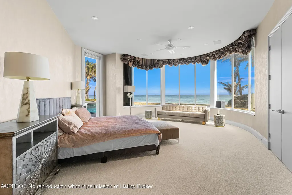 Aerial view of 1200 S Ocean Blvd Manalapan showcasing ocean-to-lake frontage, luxury estate with private pool, tennis court, and direct beach access