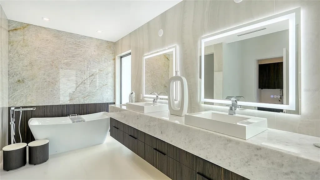 Private gym and 8-car garage at 1610 N Lodge Dr, a luxury Sarasota home with resort-style amenities and smart home features.