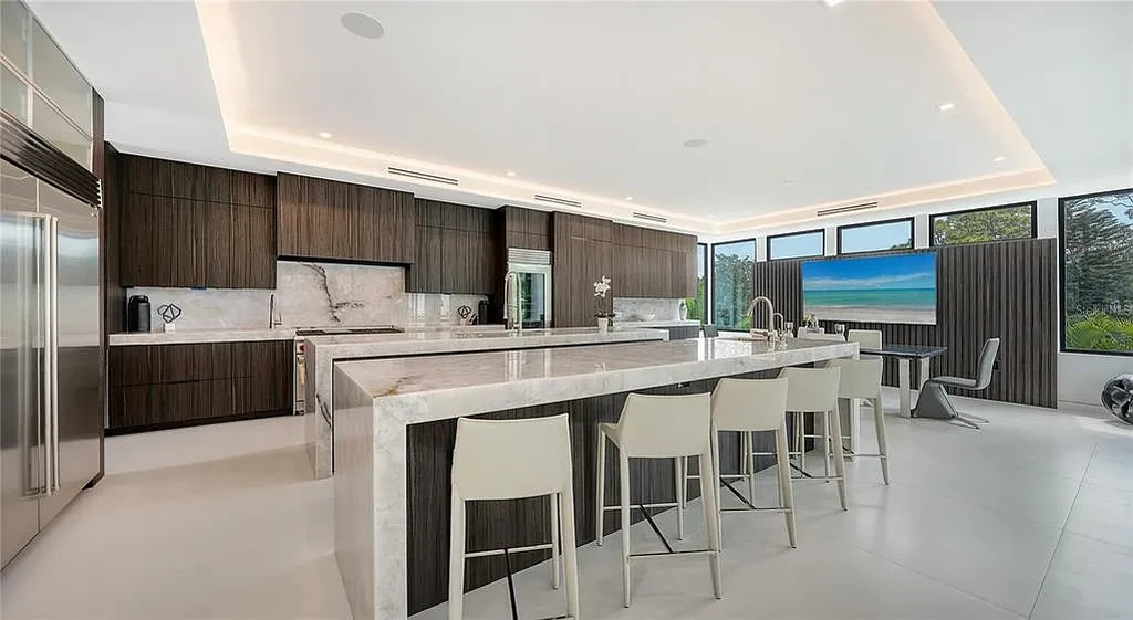 Private gym and 8-car garage at 1610 N Lodge Dr, a luxury Sarasota home with resort-style amenities and smart home features.