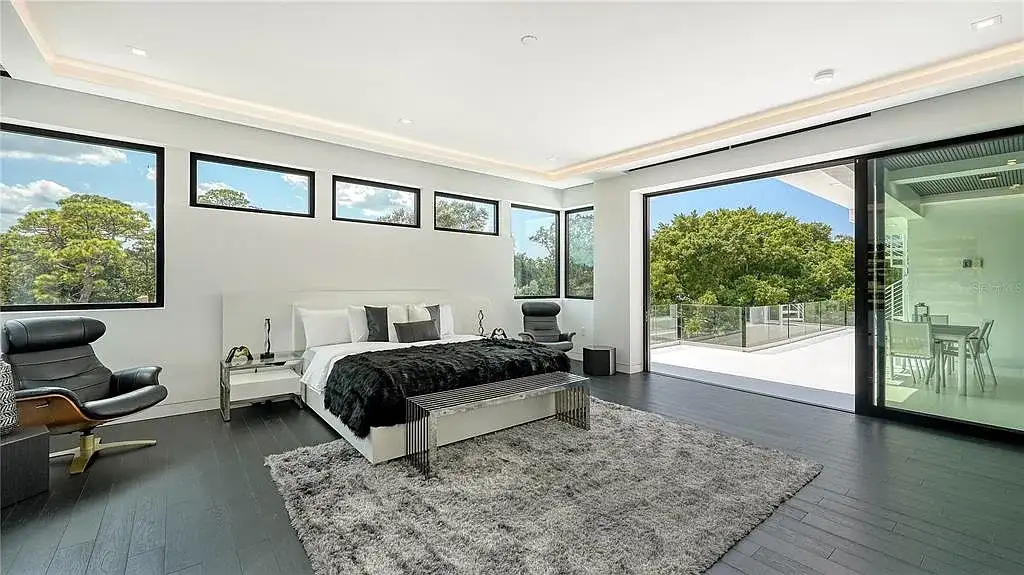 Private gym and 8-car garage at 1610 N Lodge Dr, a luxury Sarasota home with resort-style amenities and smart home features.