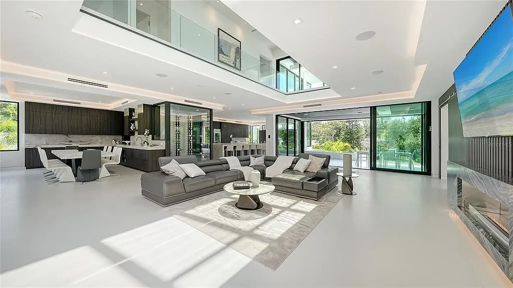 Private gym and 8-car garage at 1610 N Lodge Dr, a luxury Sarasota home with resort-style amenities and smart home features.