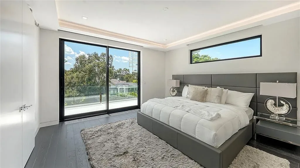 Private gym and 8-car garage at 1610 N Lodge Dr, a luxury Sarasota home with resort-style amenities and smart home features.