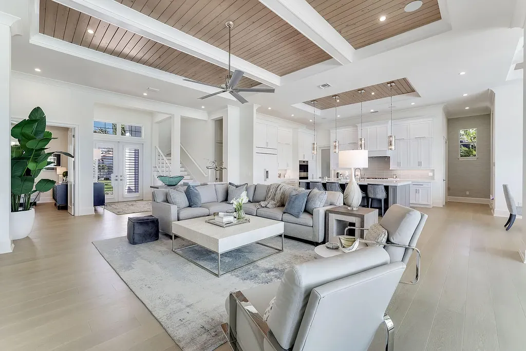Front view of 1761 Ludlow Rd showcasing modern coastal architecture and lush landscaping in Marco Island.