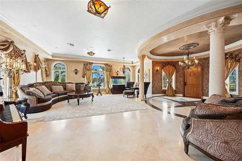 Exterior view of 290 N Washington Dr, a Mediterranean waterfront estate in Sarasota with private dock, saltwater pool, and panoramic bay views