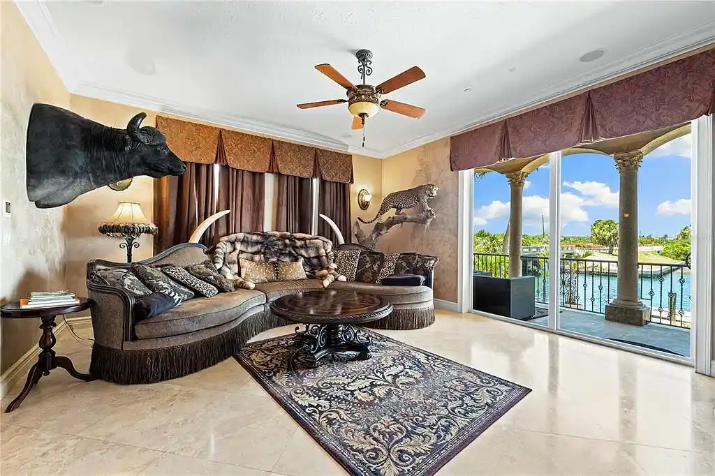 Exterior view of 290 N Washington Dr, a Mediterranean waterfront estate in Sarasota with private dock, saltwater pool, and panoramic bay views