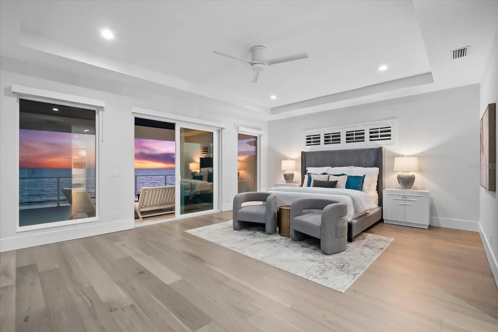 32 Gulf Blvd luxury beachfront estate in Indian Rocks Beach, FL featuring dual water frontage, modern coastal design, and private dock