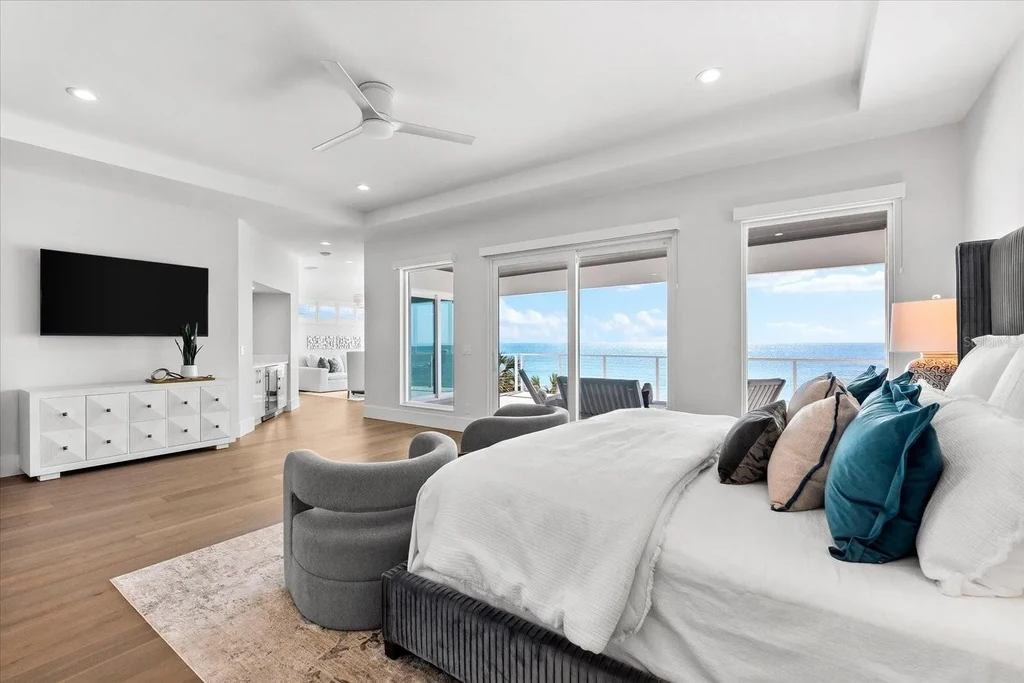 32 Gulf Blvd luxury beachfront estate in Indian Rocks Beach, FL featuring dual water frontage, modern coastal design, and private dock