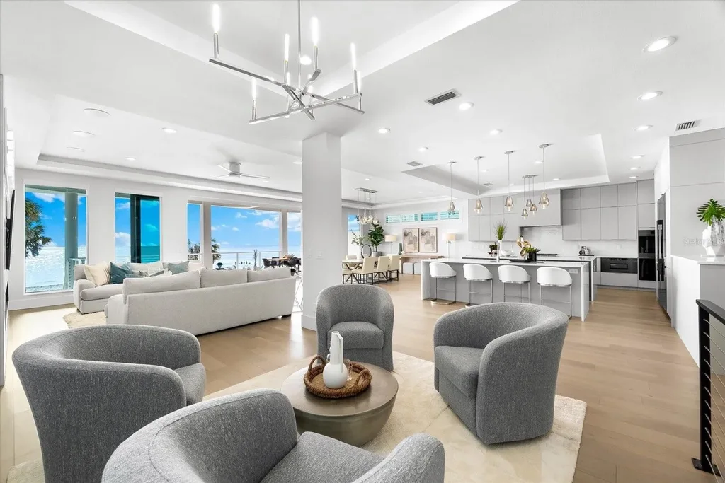 32 Gulf Blvd luxury beachfront estate in Indian Rocks Beach, FL featuring dual water frontage, modern coastal design, and private dock