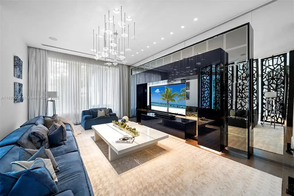 Luxurious primary suite with spa bathroom and bayfront terrace in Coral Gables home for sale