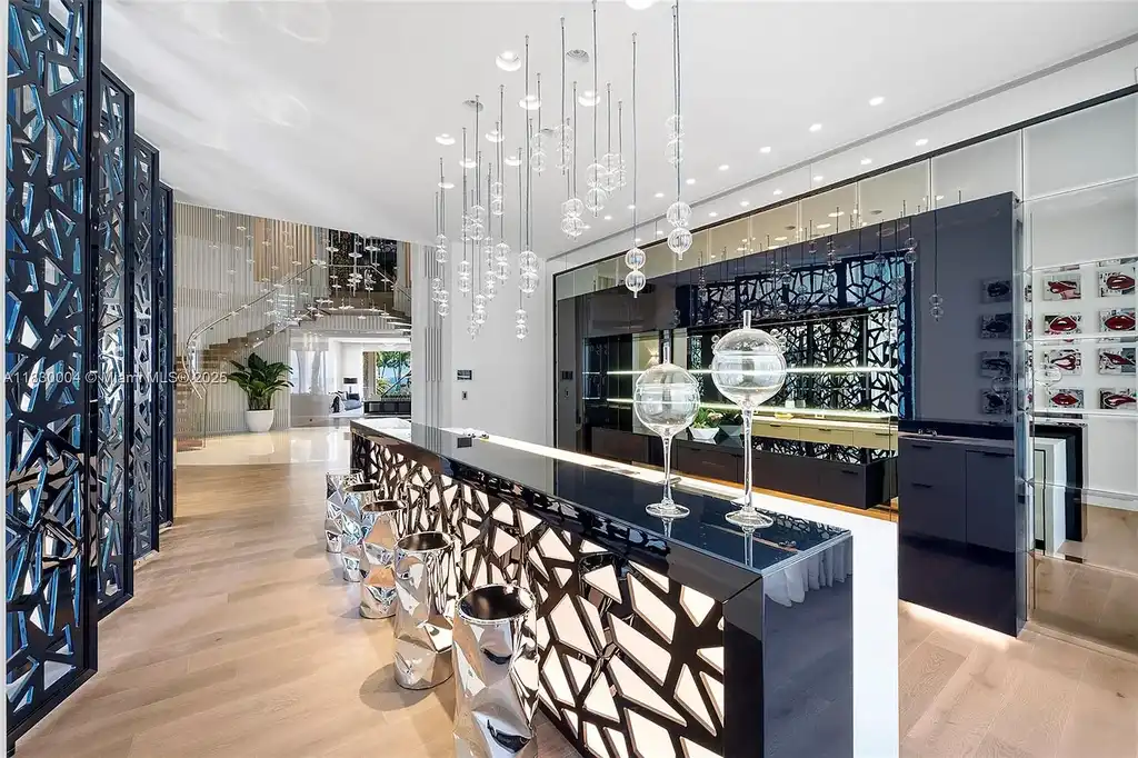 Luxurious primary suite with spa bathroom and bayfront terrace in Coral Gables home for sale