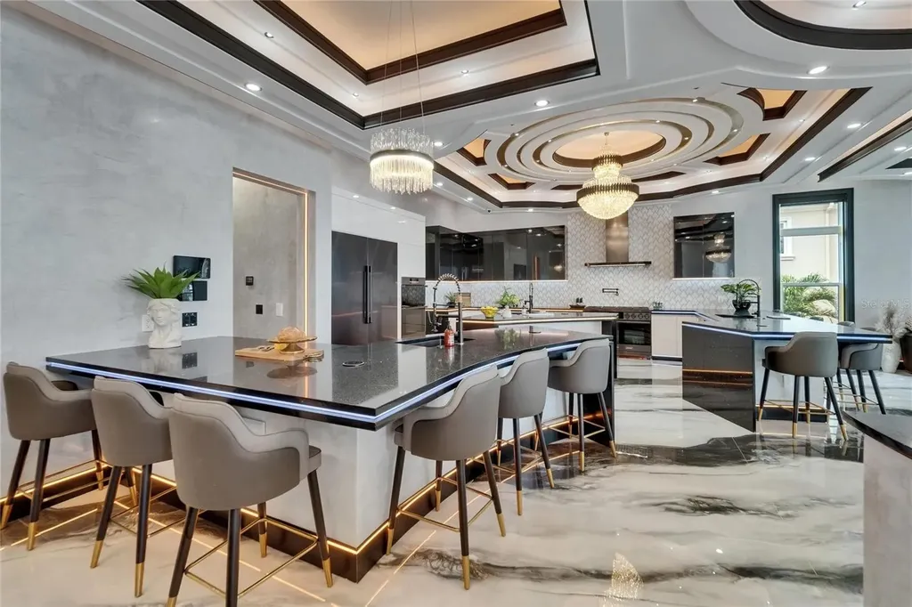 Stunning bayfront exterior of 6526 Surfside Blvd in Apollo Beach, showcasing modern design and private dock access