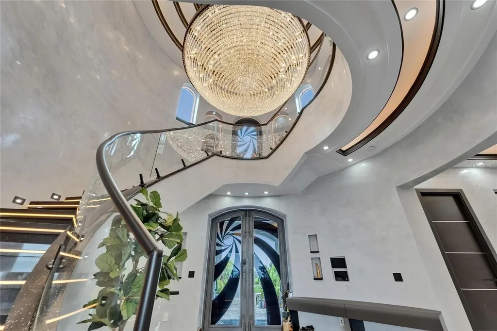 Stunning bayfront exterior of 6526 Surfside Blvd in Apollo Beach, showcasing modern design and private dock access