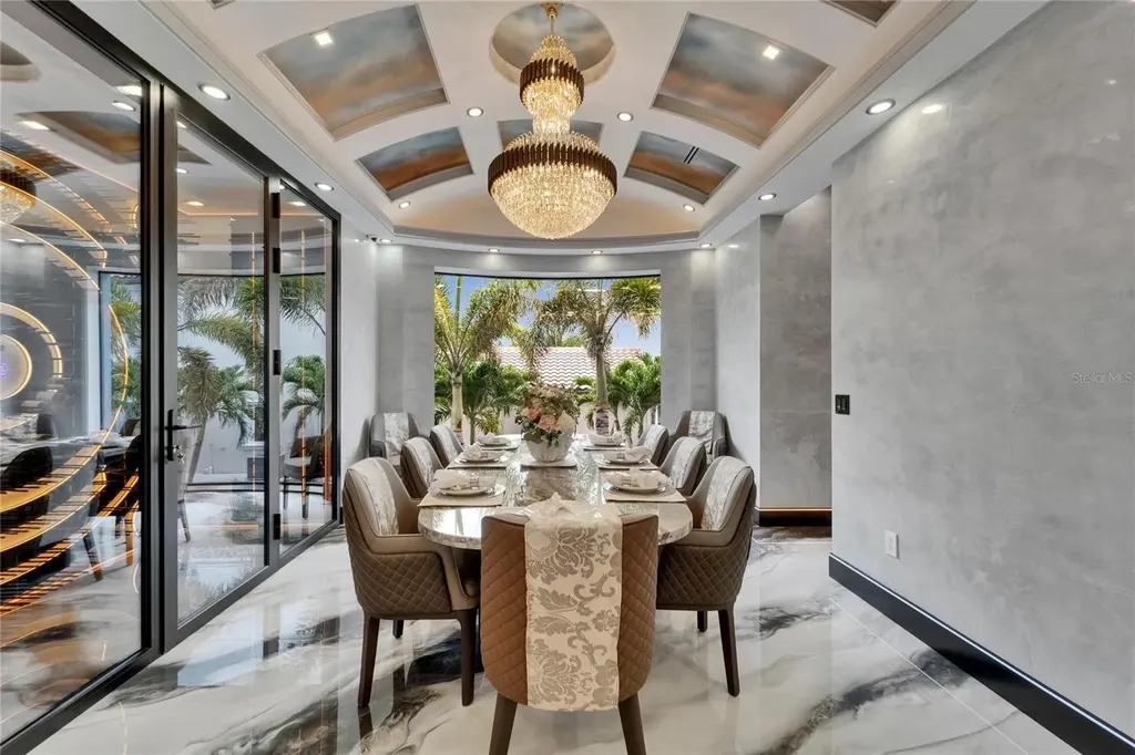 Stunning bayfront exterior of 6526 Surfside Blvd in Apollo Beach, showcasing modern design and private dock access