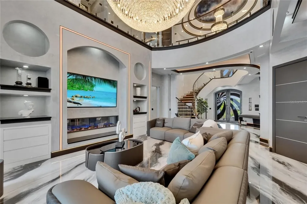 Stunning bayfront exterior of 6526 Surfside Blvd in Apollo Beach, showcasing modern design and private dock access