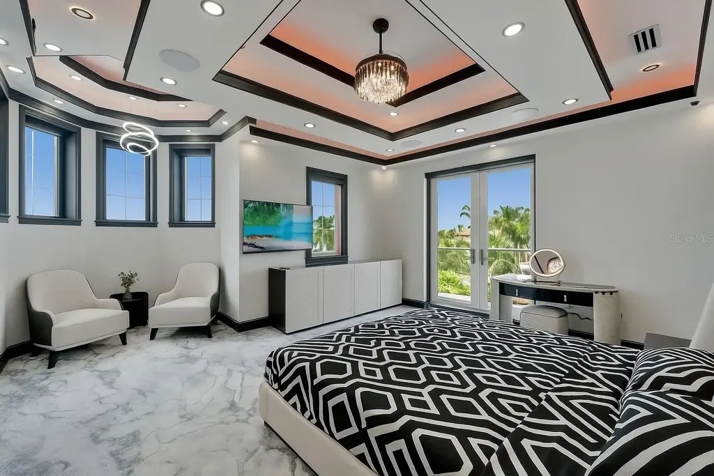 Stunning bayfront exterior of 6526 Surfside Blvd in Apollo Beach, showcasing modern design and private dock access