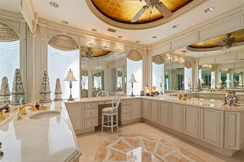 Aerial view of 845 Longboat Club Rd showcasing the estate's beachfront location in Longboat Key, Florida