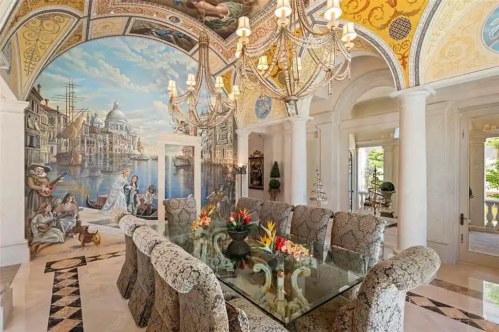 Aerial view of 845 Longboat Club Rd showcasing the estate's beachfront location in Longboat Key, Florida