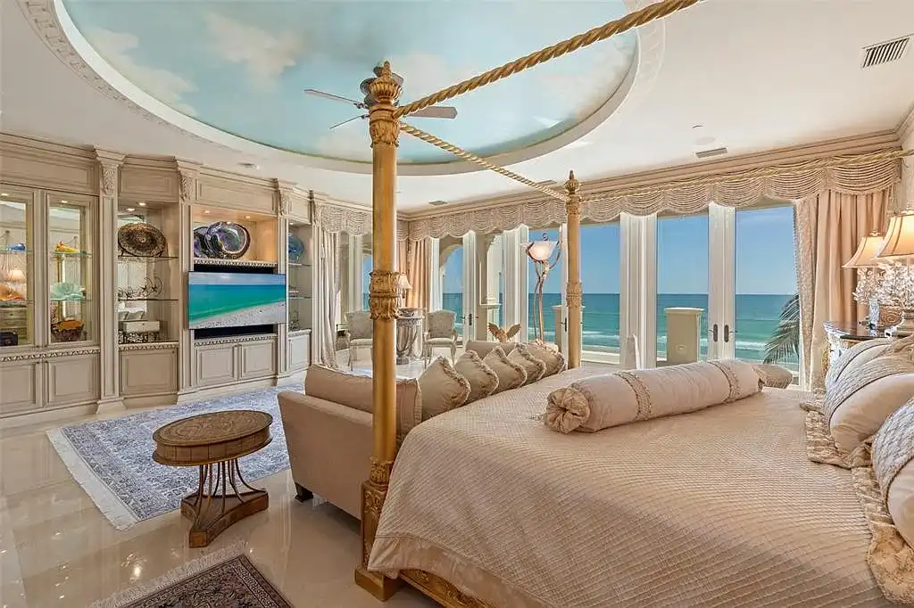 Aerial view of 845 Longboat Club Rd showcasing the estate's beachfront location in Longboat Key, Florida