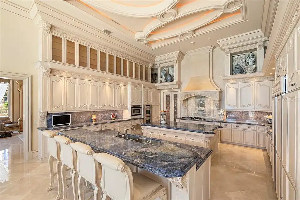 Aerial view of 845 Longboat Club Rd showcasing the estate's beachfront location in Longboat Key, Florida