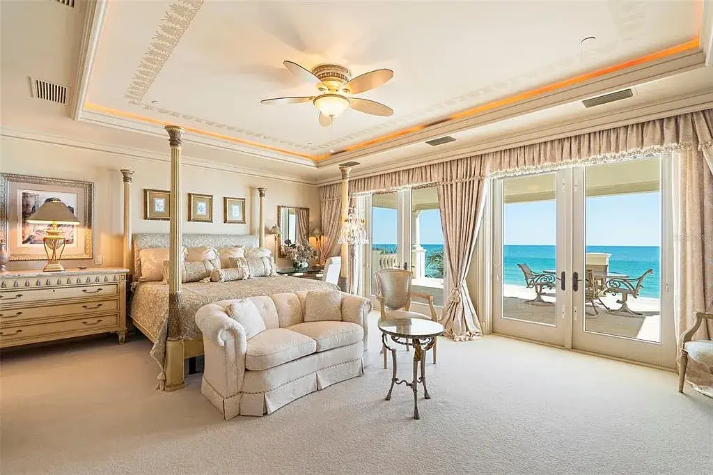 Aerial view of 845 Longboat Club Rd showcasing the estate's beachfront location in Longboat Key, Florida