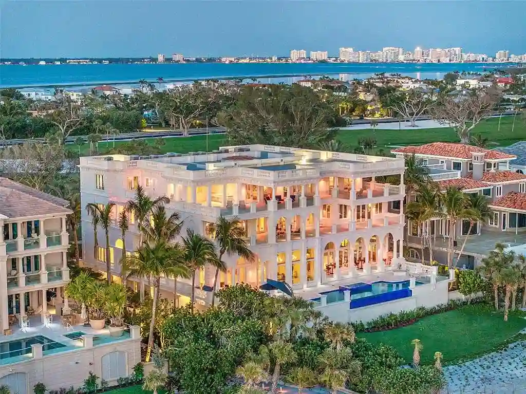 Aerial view of 845 Longboat Club Rd showcasing the estate's beachfront location in Longboat Key, Florida
