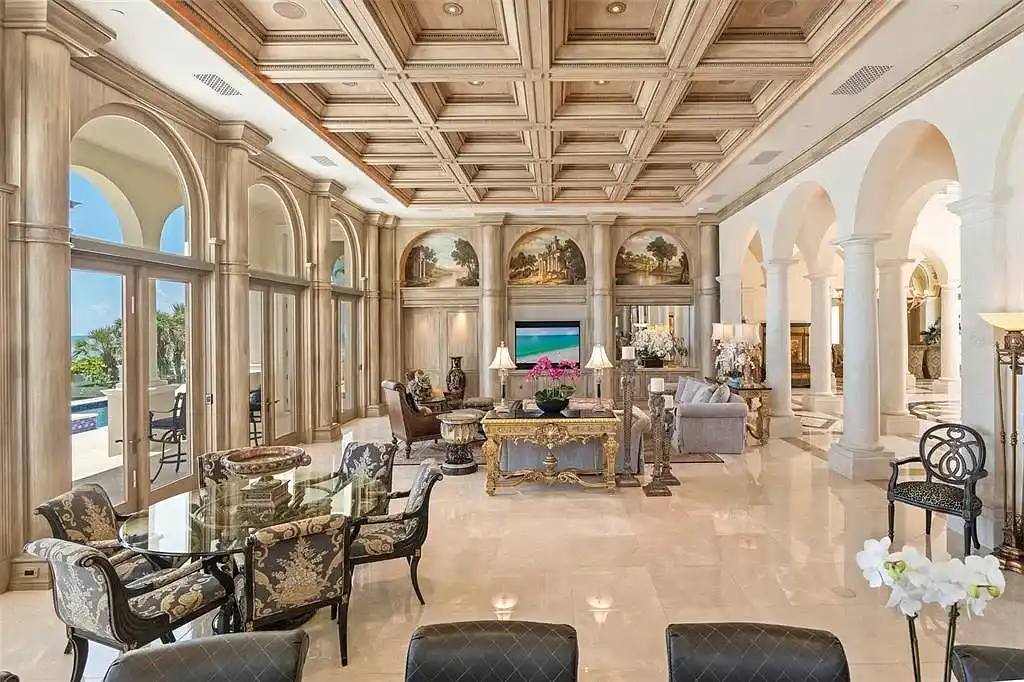Aerial view of 845 Longboat Club Rd showcasing the estate's beachfront location in Longboat Key, Florida