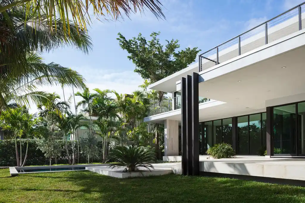 99 Residence in Bay Harbor by SDH Studio A Tropical Modern Home Framing Water Light and Family Living 3