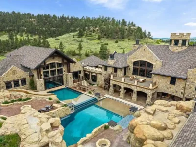 Iconic Montana Chateau at 5650 Canyonwoods Dr Offers Breathtaking Views and Timeless Elegance for 26 1