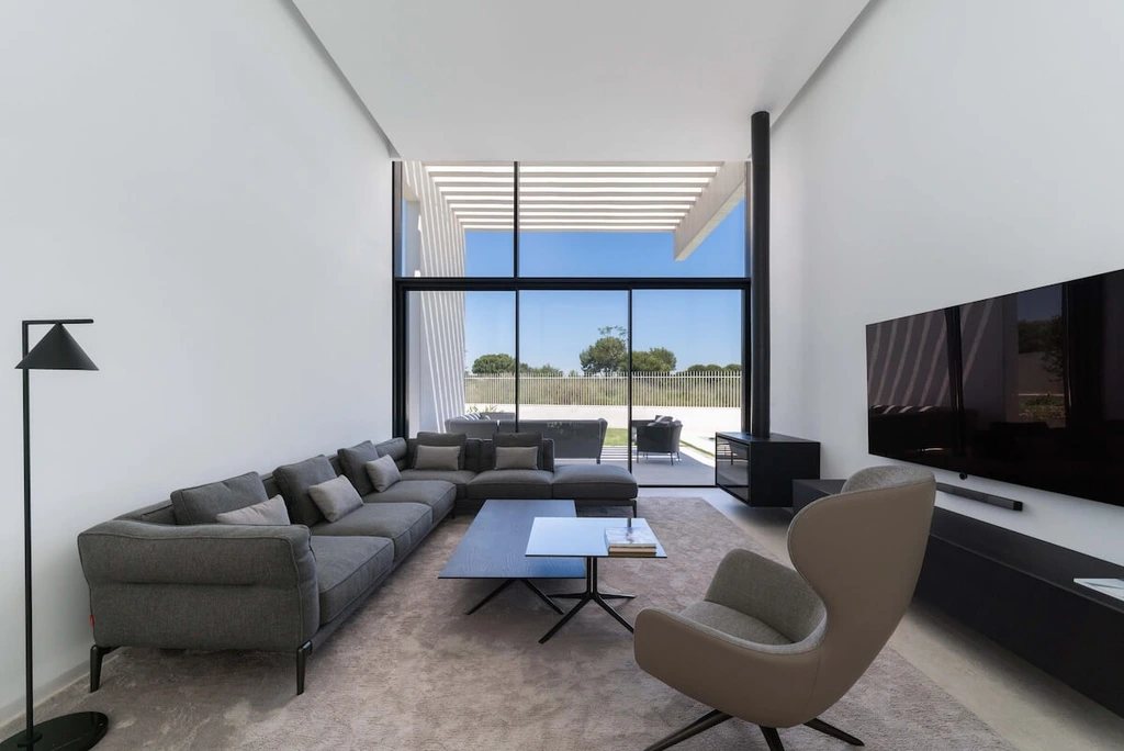 Oriol House by Ruben Muedra A Sculptural White Concrete Retreat Overlooking a Valencian Golf Course 7