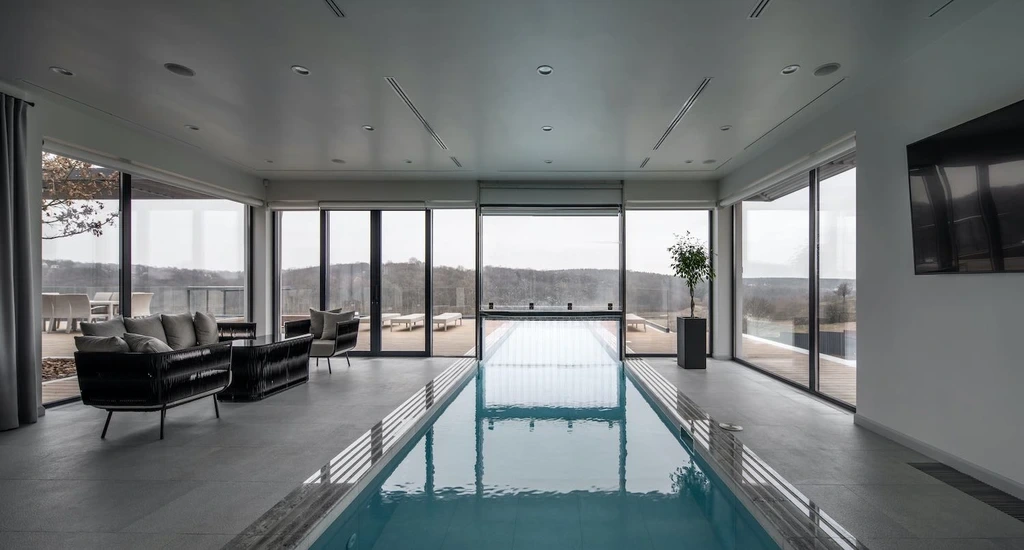 Vin House by Bogdanova Bureau Blends Modern Rationalism with Riverfront Serenity in Ukraine 11
